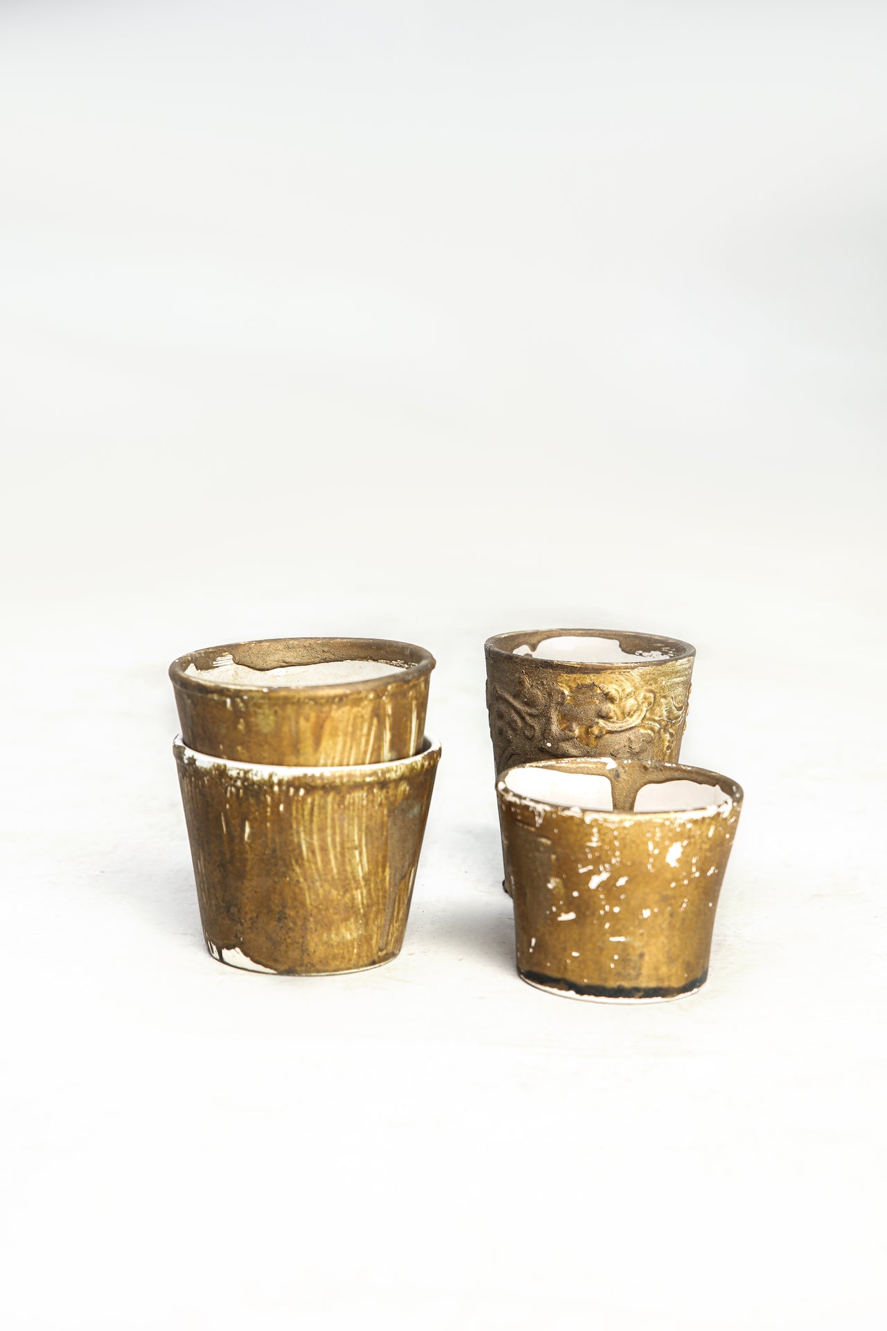 Set Of Golden Cups